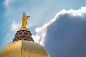 Notre Dame Golden Dome and clouds